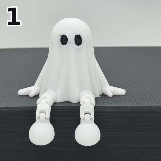 Halloweenfiguren met bungelende beentjes