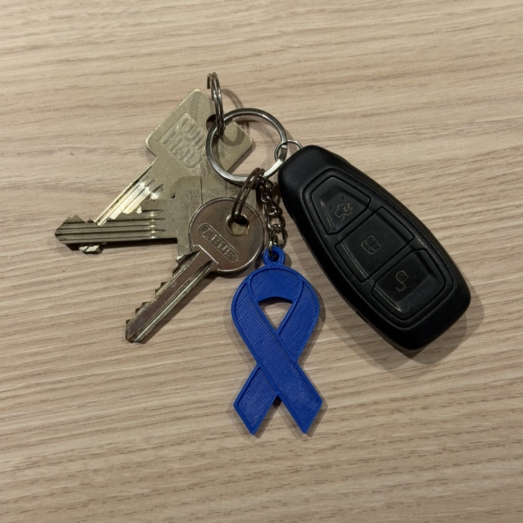 (Steun)lintje tegen kanker sleutelhanger  