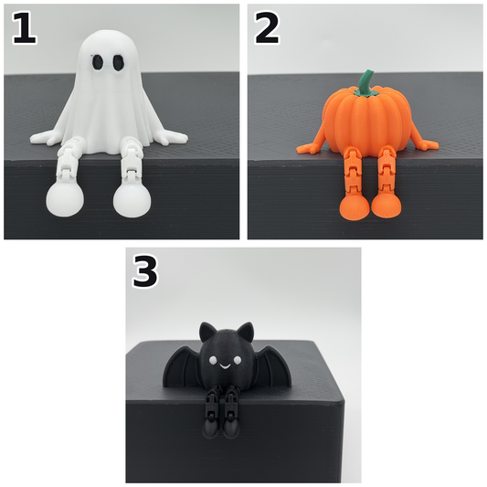 Halloweenfiguren met bungelende beentjes
